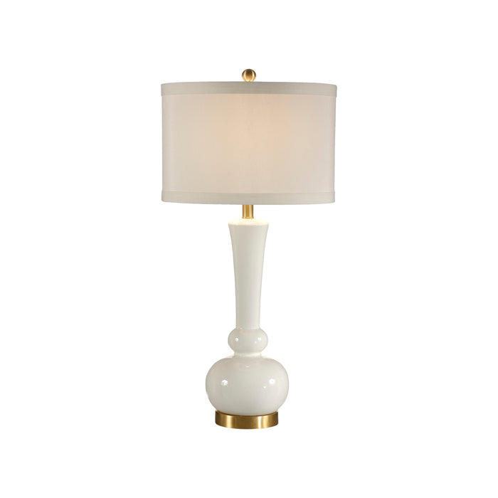 White table lamp with gold accents on a white background
