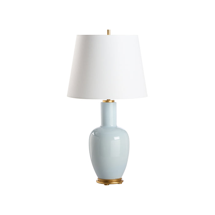 Light blue table lamp with a white shade on a white background