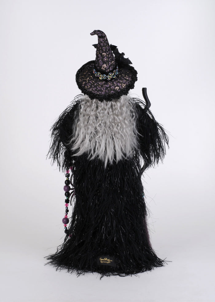 Decorative Halloween figure with black and white feathers on a white background