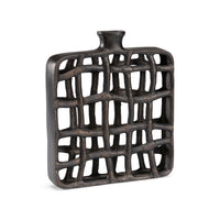 Decorative vase with a lattice design on a white background