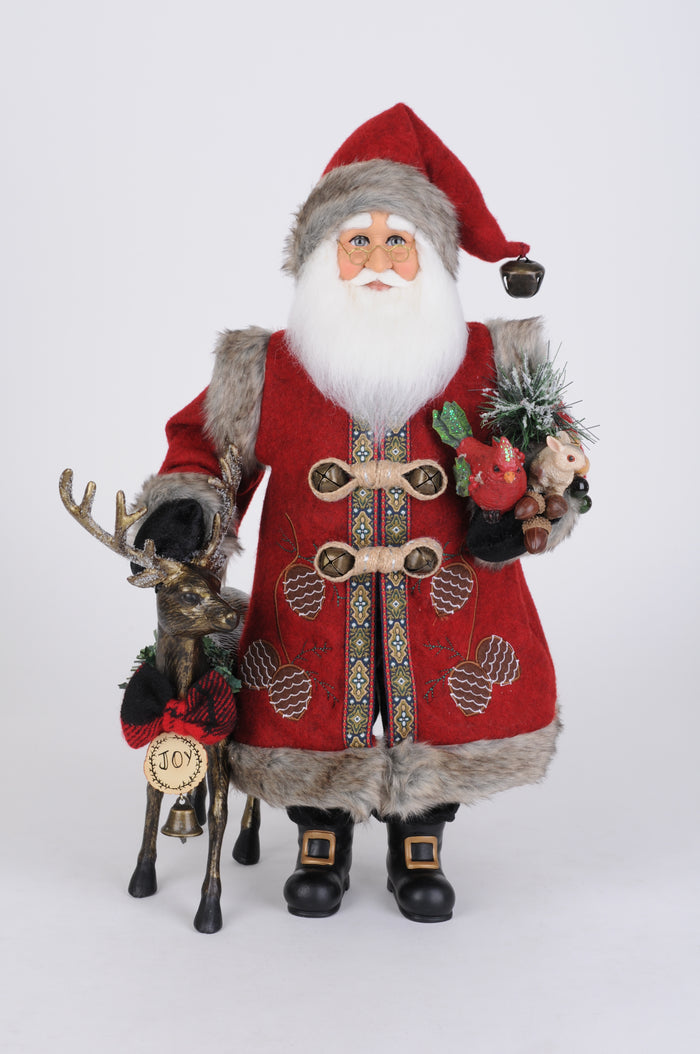 Decorative figure of Santa Claus with a reindeer on a white background