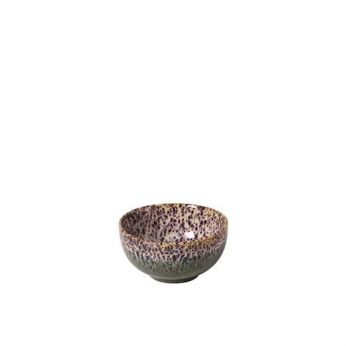 Ceramic bowl with speckled pattern on a white background