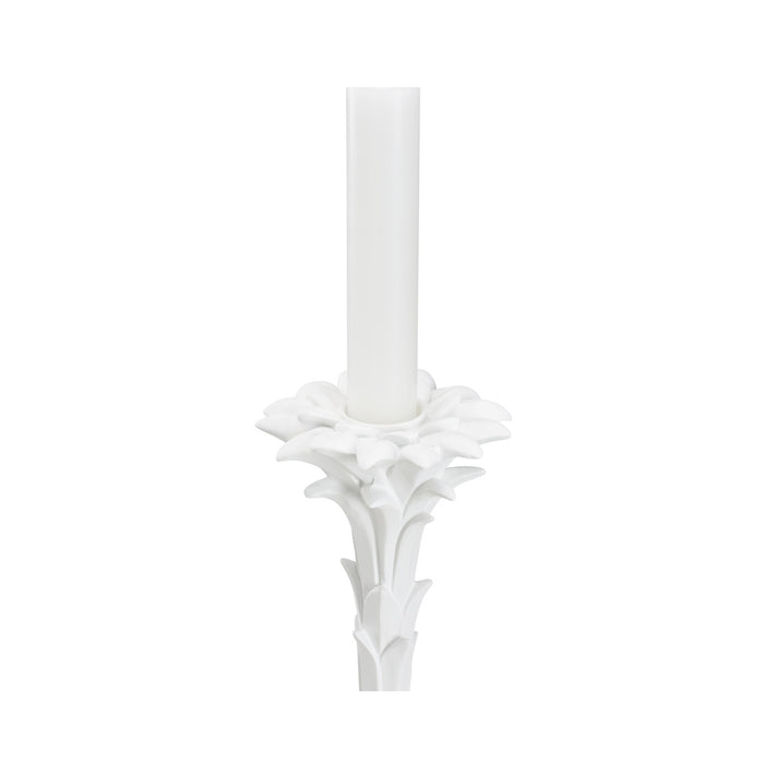 White candle holder with floral design on a white background