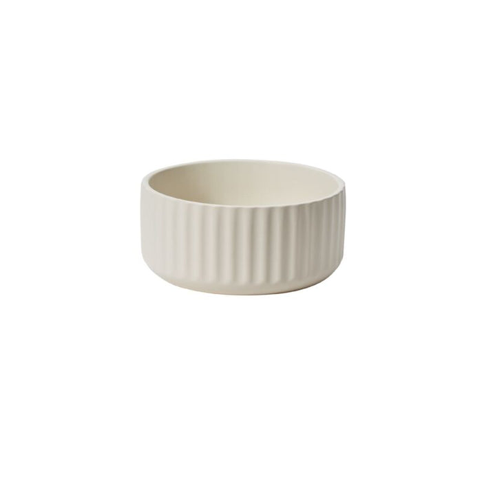 Beige ceramic bowl on a white background