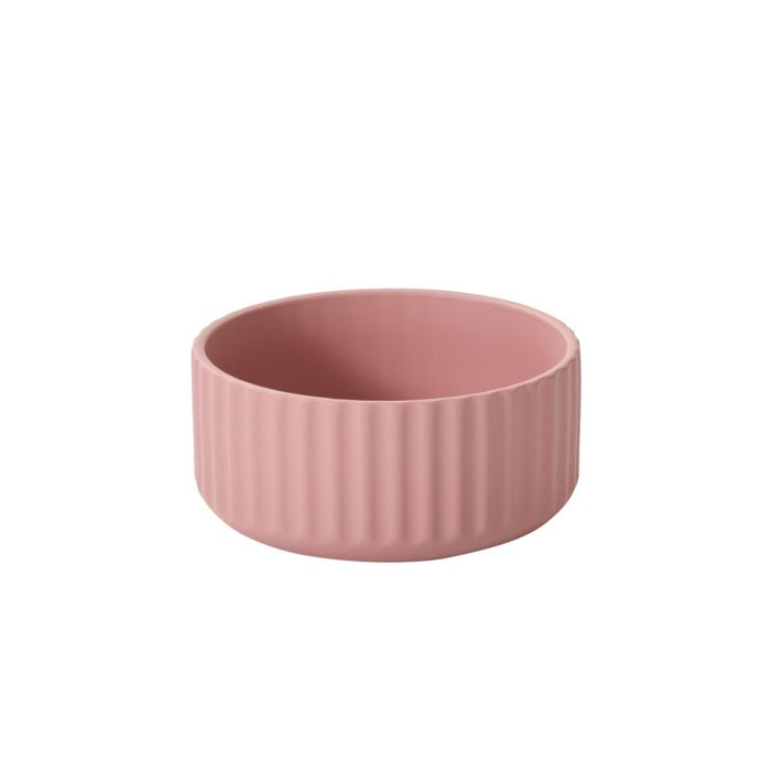 Pink ceramic bowl on a white background