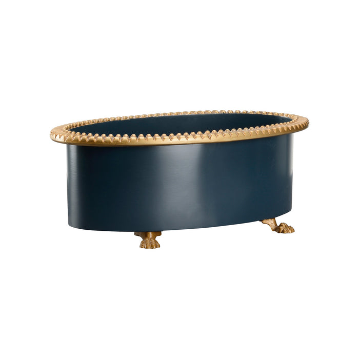 Black oval table with gold rim and feet on a white background