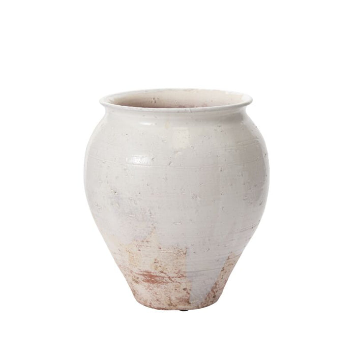 White ceramic vase on a white background