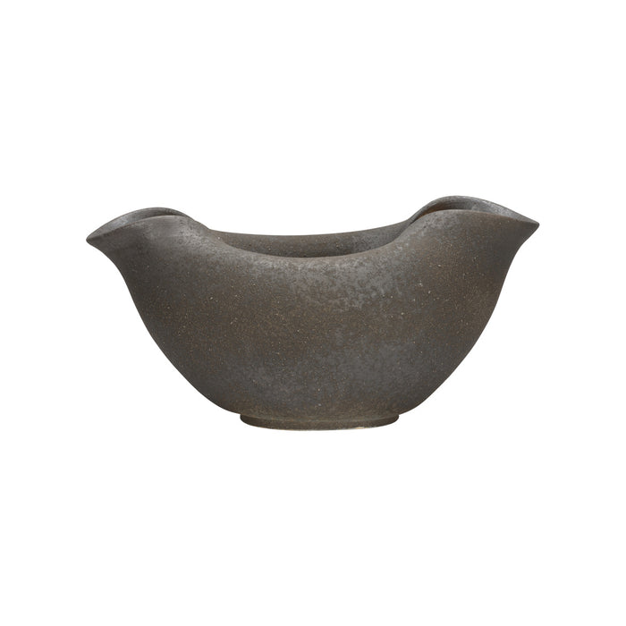 Decorative bird-shaped pot on a white background
