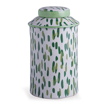 A cylindrical porcelain jar with a green animal print pattern and a lift-off lid.