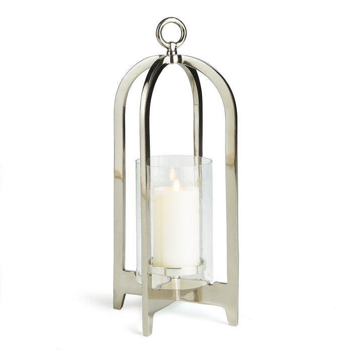 A sleek chrome finish lantern with a round finial top and a clear glass enclosure holding a candle.