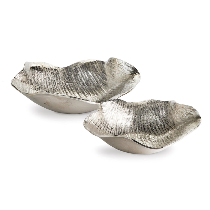 Set of two metallic silver decorative bowls with irregular curved shapes and textured, ribbed surfaces on white background