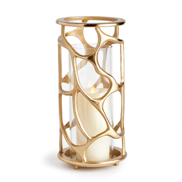 A matte gold finish hurricane-shaped candle holder with a meandering design and a glass cylinder.