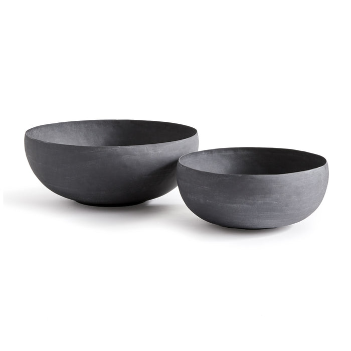 Pair of dark gray stone bowls, smooth matte finish, nested sizes on white background.
