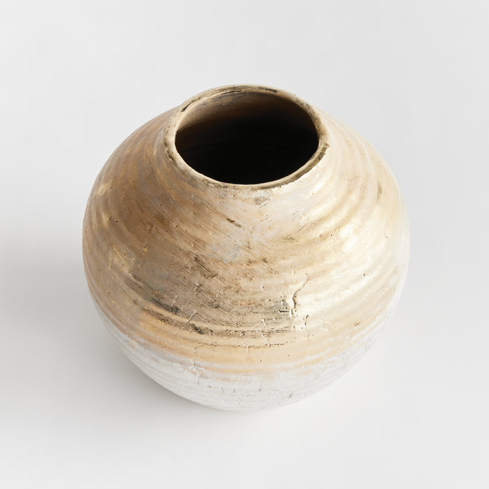 Large rounded ceramic vase with a mottled beige and white glaze, wide mouth, subtle horizontal banding, on light background.