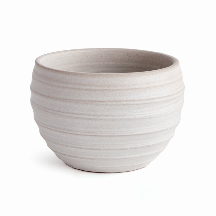 Cream ceramic pot with horizontal ribbed bands and a smooth, rounded silhouette on a white background.