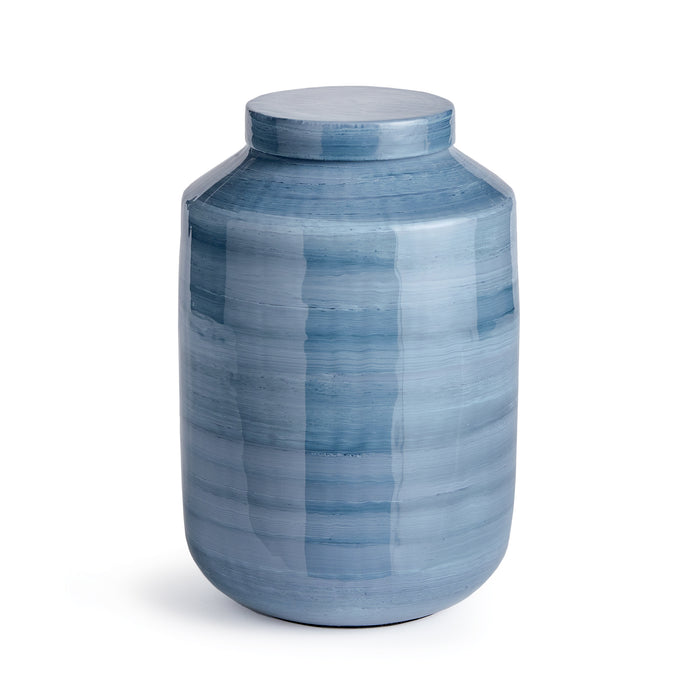 Powder blue ceramic ginger jar with a glossy striped glaze and matching lid, cylindrical body, light to dark blue bands on
