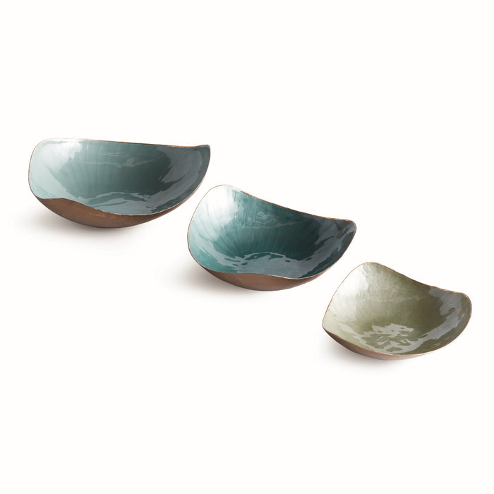 Set of three ceramic decorative bowls in teal, darker teal, and sage green with brown exterior, curving square shapes on a