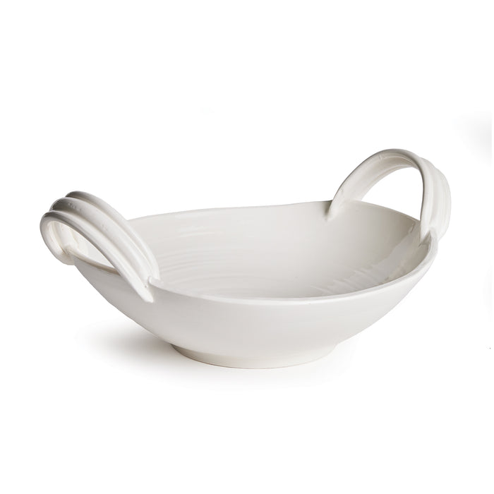White decorative low bowl with two curved handles, glossy ceramic, plain background.