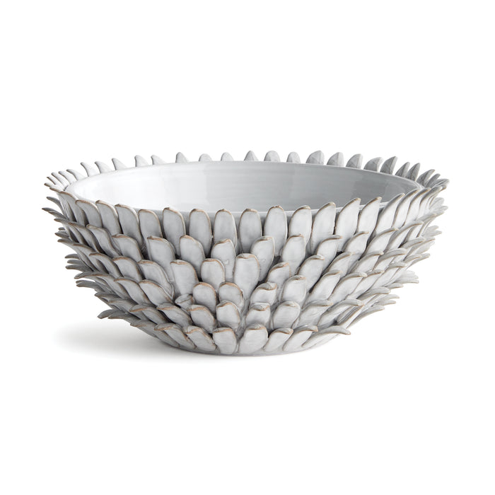 White ceramic decorative bowl with layered, petal-like scales forming a textured exterior; smooth interior.
