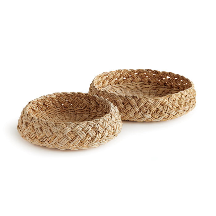 Two round, brown abaca French braided baskets on a white background.