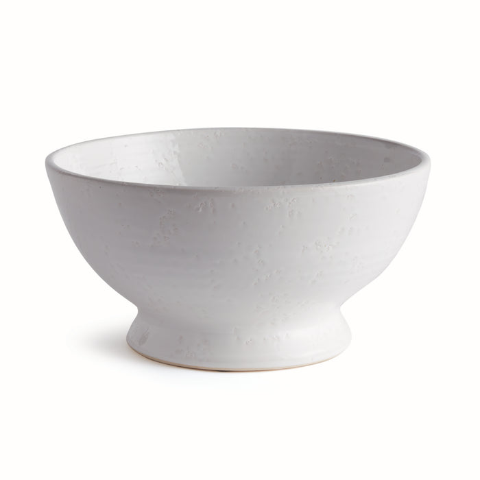 Large white ceramic bowl with a smooth, slightly speckled glaze and a short pedestal base, open bowl top, plain background.