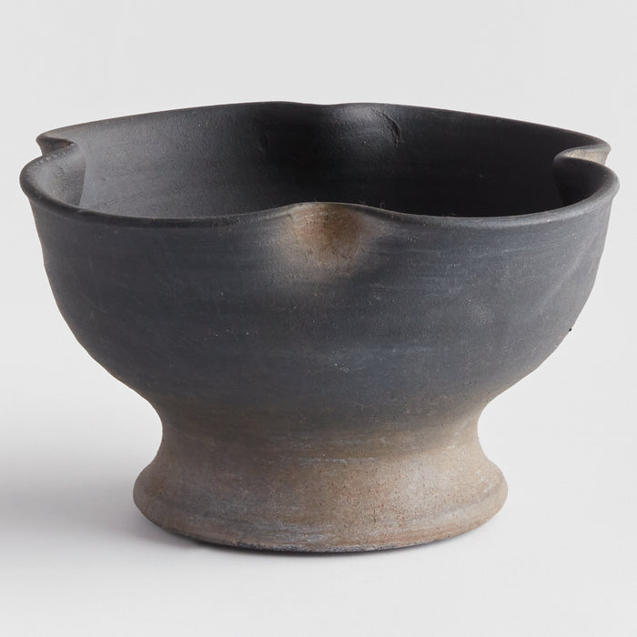 Dark charcoal ceramic decorative bowl with a wide opening and a light, unglazed foot pedestal.