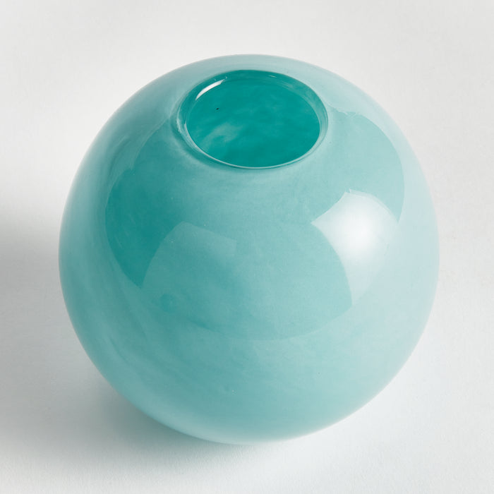 Turquoise glass vase with a rounded, bulbous shape and a small circular opening at the top on a light background.