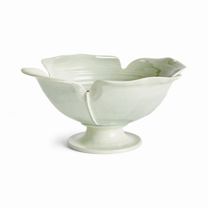 Pale green ceramic footed bowl with petal-like scalloped rim on a short pedestal base, glossy glaze.
