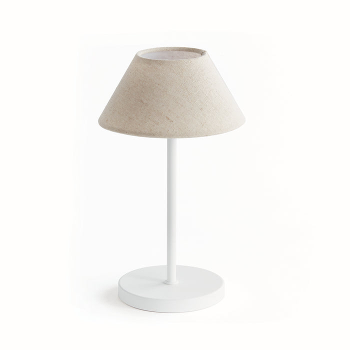 A cordless LED lamp with an empire linen shade, standing on a white base, against a white background.