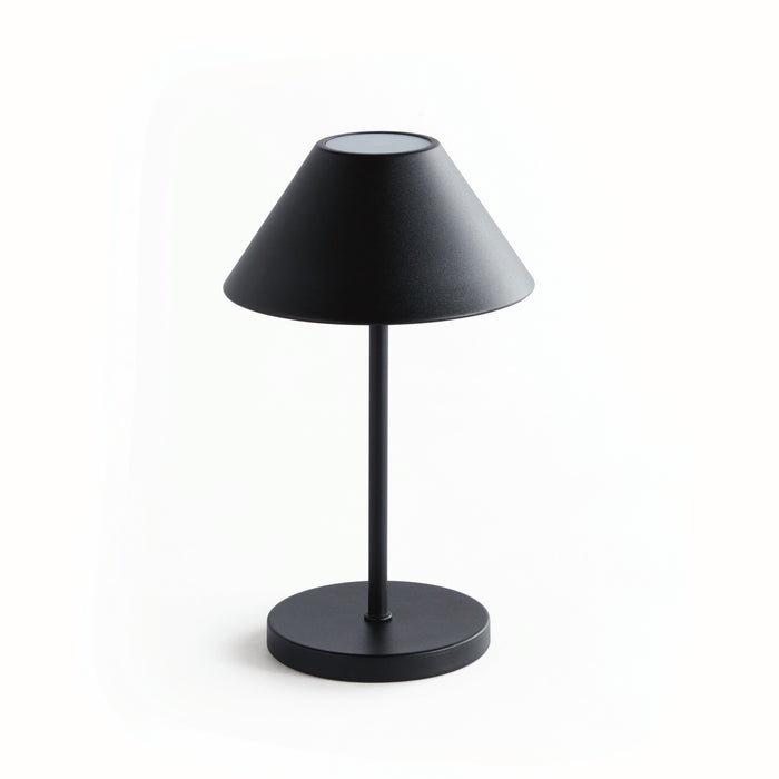 A black cordless LED lamp with an empire linen shade, featuring a single button on the top for light control, and a circular base for stability.