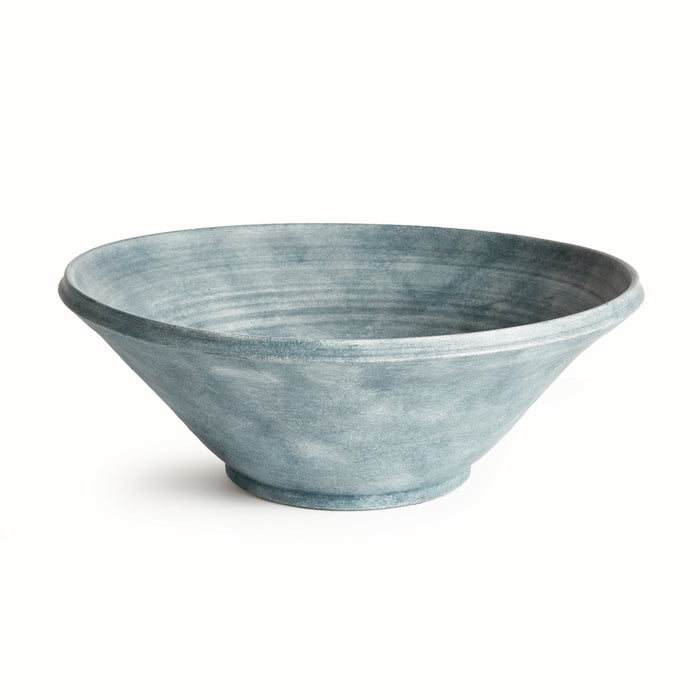 Blue ceramic bowl on a white background