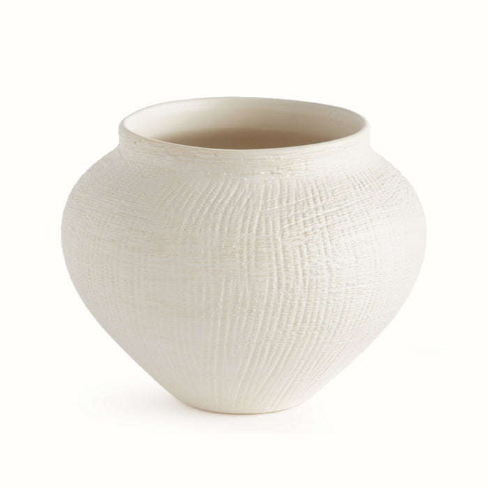 Opaque cream ceramic pot with a rounded, bulbous body, textured crosshatch pattern, and a narrow rim against a white