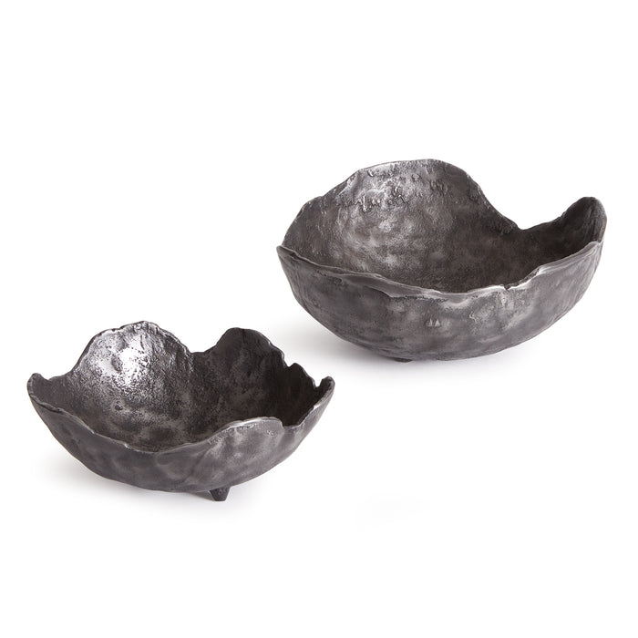 Two dark gray organic bowls with irregular, textured edges, one small and one large, matte metal finish, set on white