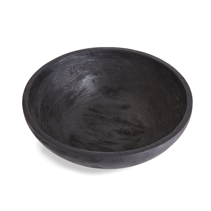 Dark black, round wooden serving bowl with visible wood grain, matte finish, shallow curved sides, set against a white