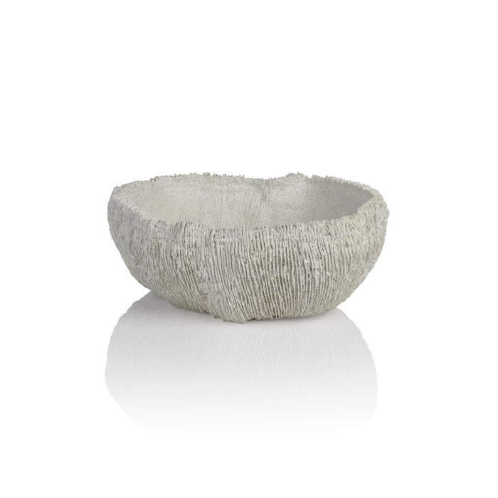 Textured ceramic bowl on a white background