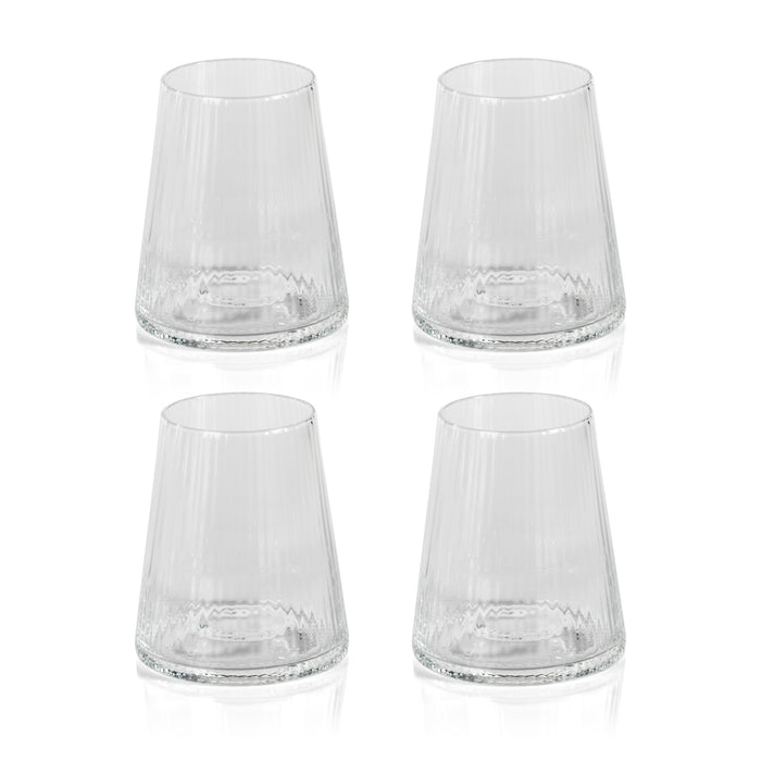 Four clear glass tumblers on a white background