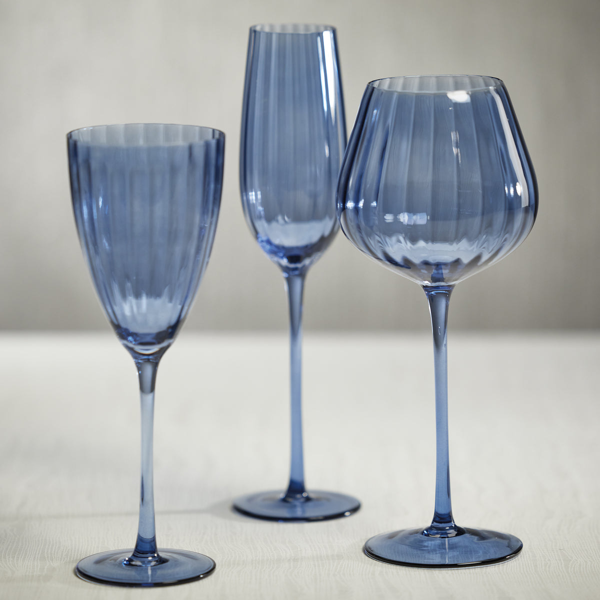 Zodax Malden Optic Champagne Flutes, Blue Azure, Set of 4