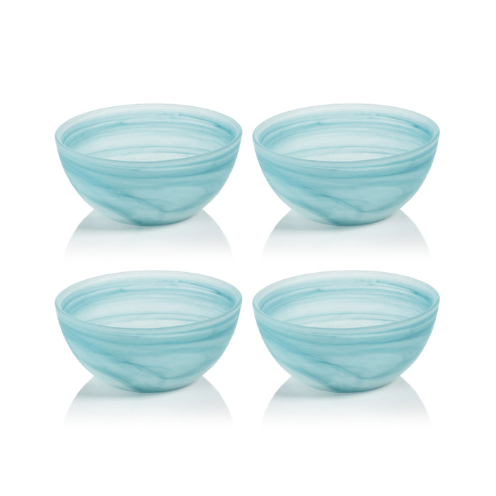 Four light blue ceramic bowls with a wavy pattern on a white background