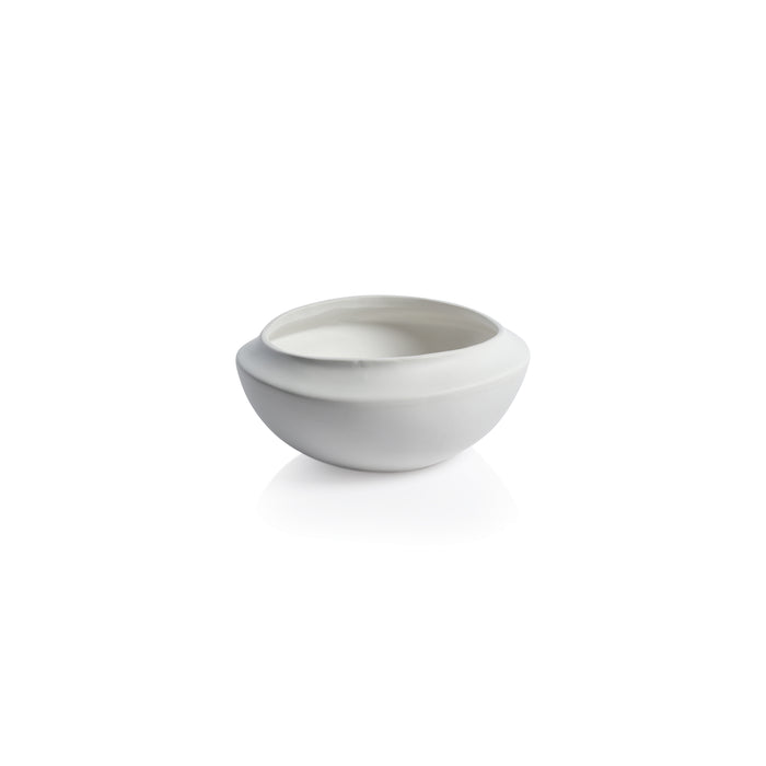 Beige ceramic ramekin on a white background