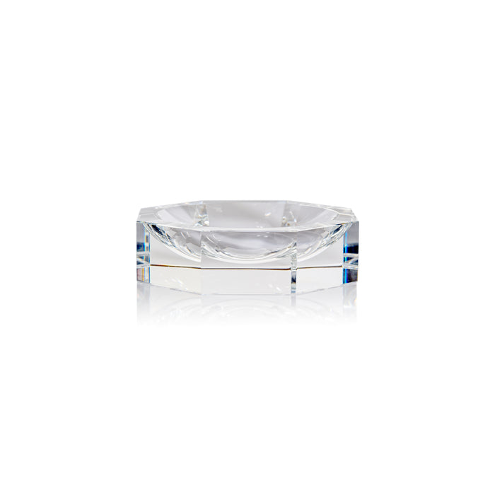 Clear glass hexagonal object on a white background