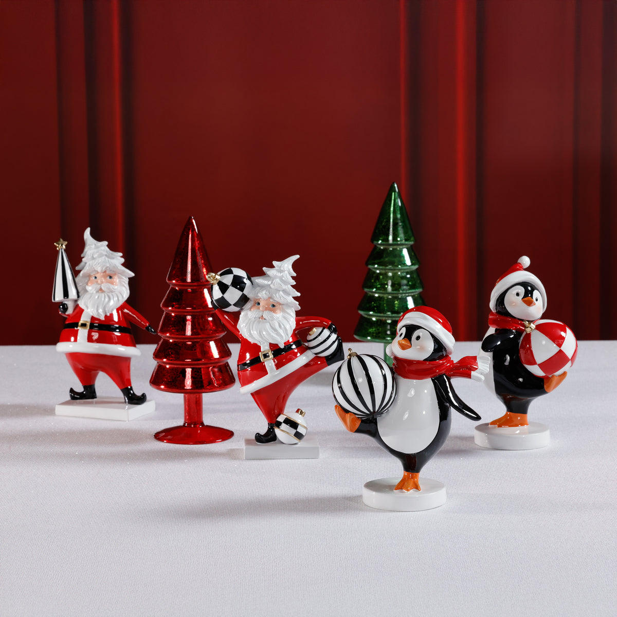 Zodax Festive Four Santa & Penguin Figurines, Set of 4, Holiday Decoration, 7" Tall