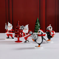Zodax Festive Four Santa & Penguin Figurines, Set of 4, Holiday Decoration, 7" Tall