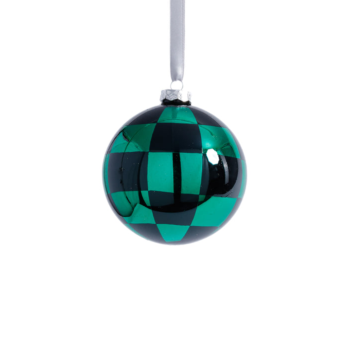 Green and black checkered Christmas ornament on a white background