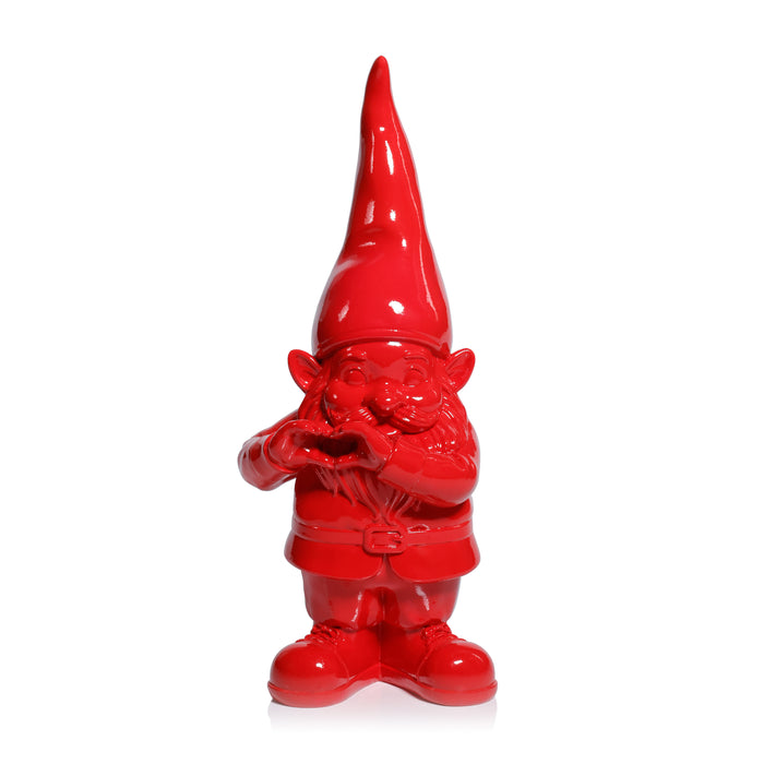 Red gnome figurine on a white background