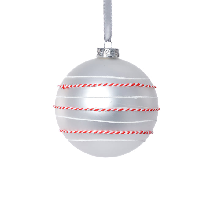 Silver Christmas ball ornament with red and white candy cane pattern on a white background