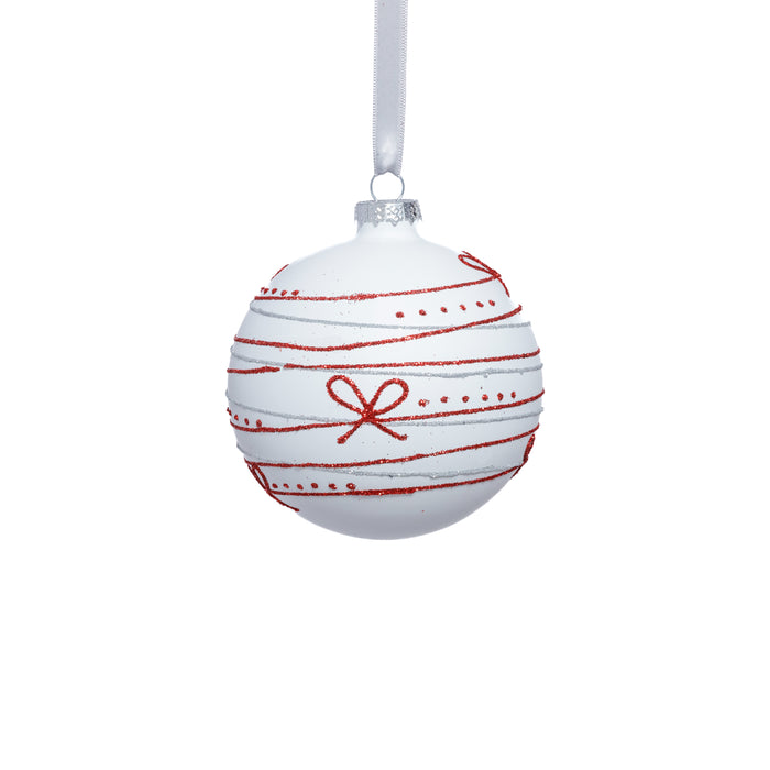 White Christmas ornament with red decorative elements on a white background