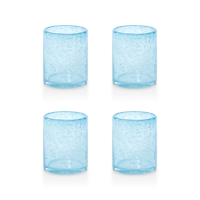 Four light blue glass tumblers with a textured surface on a white background