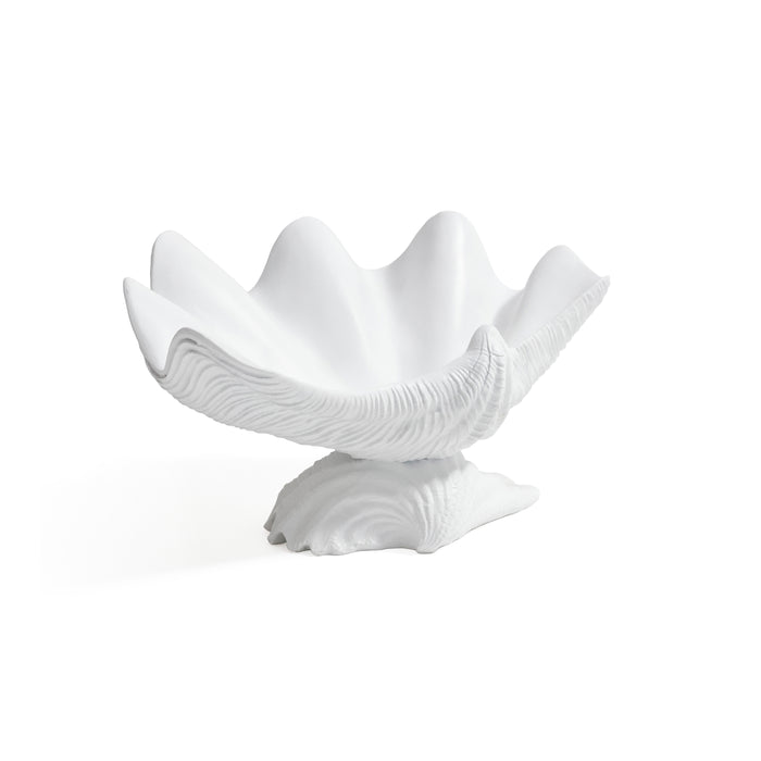 White ceramic bowl with wavy design on a white background
