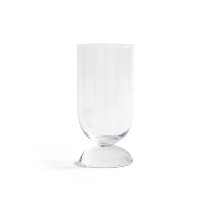 Clear glass goblet on a white background