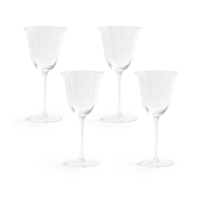 Set of five clear wine glasses on a white background